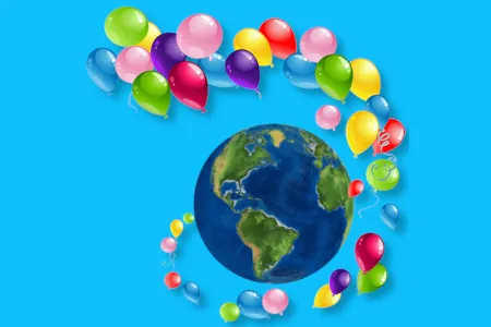 Multiple coloured balloons circling the earth