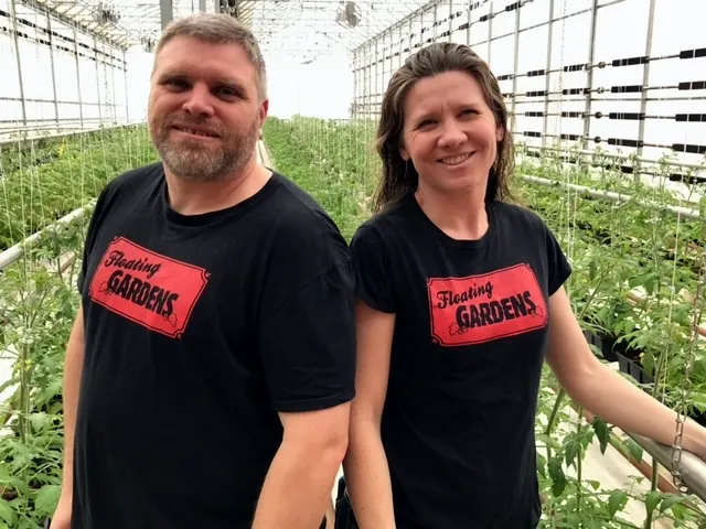 Chris on the left & Rachel on the right at Floating Gardens inside green house.