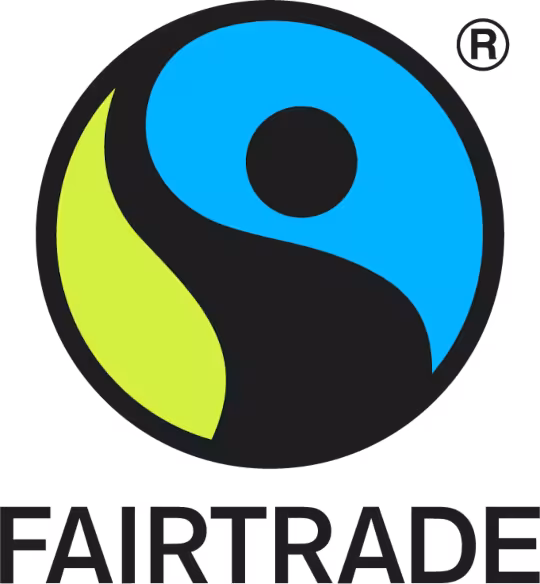 A circular logo with a swirl in the middle creating a divide between green and blue with a black dot on the blue side and the title below of 'Fairtrade'.