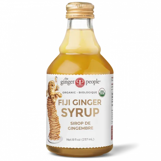 Glass bottle of golden brown Fiji Ginger Syrup by The Ginger People