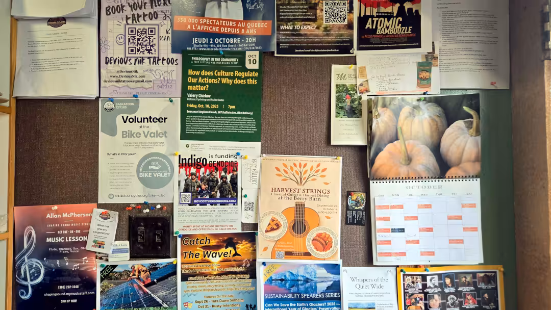 A view of a large bulletin board full of various community events and Steep Hill Food Co-op volunteer calendar.