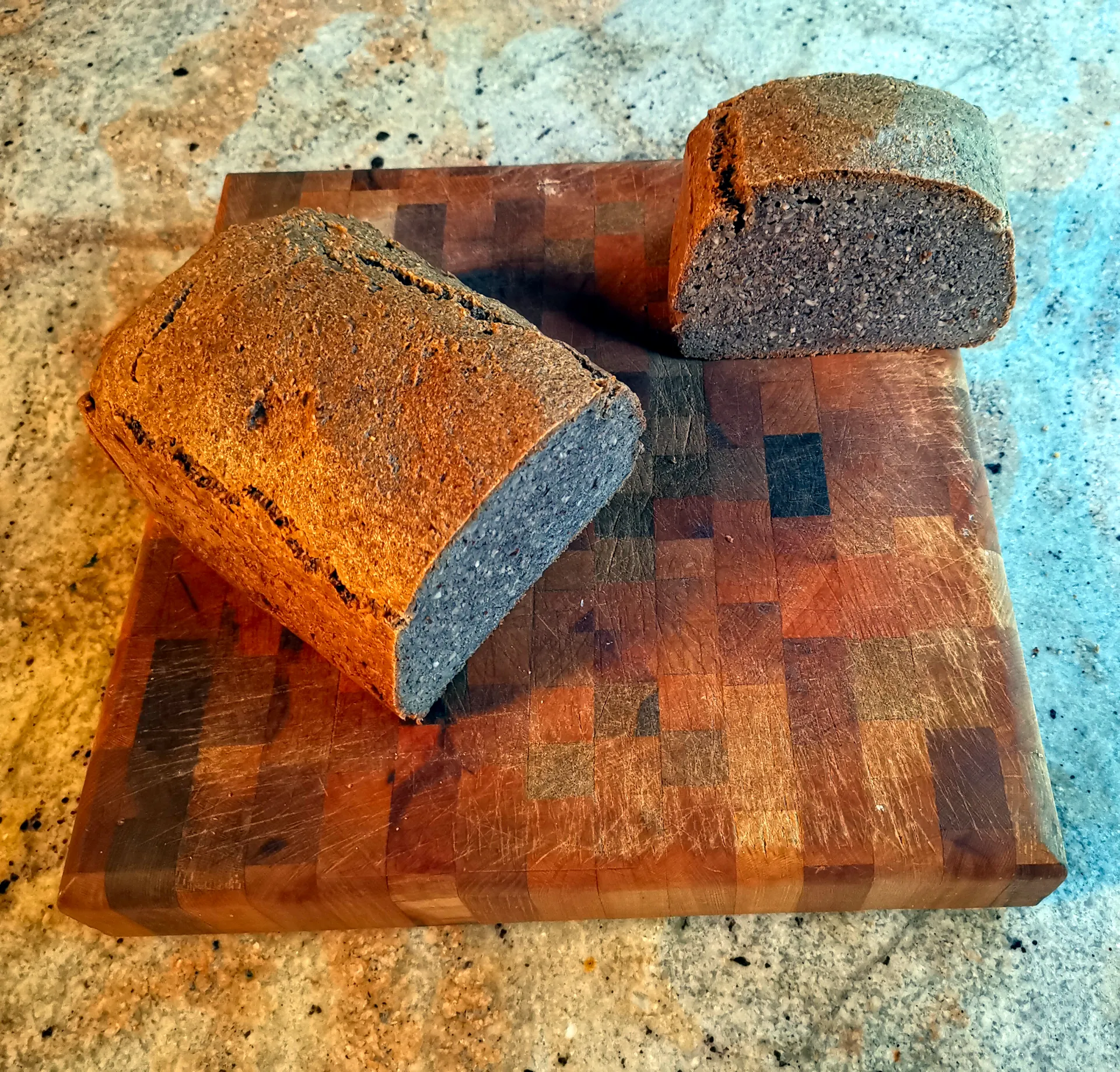 sliced almond bread on a cutting board