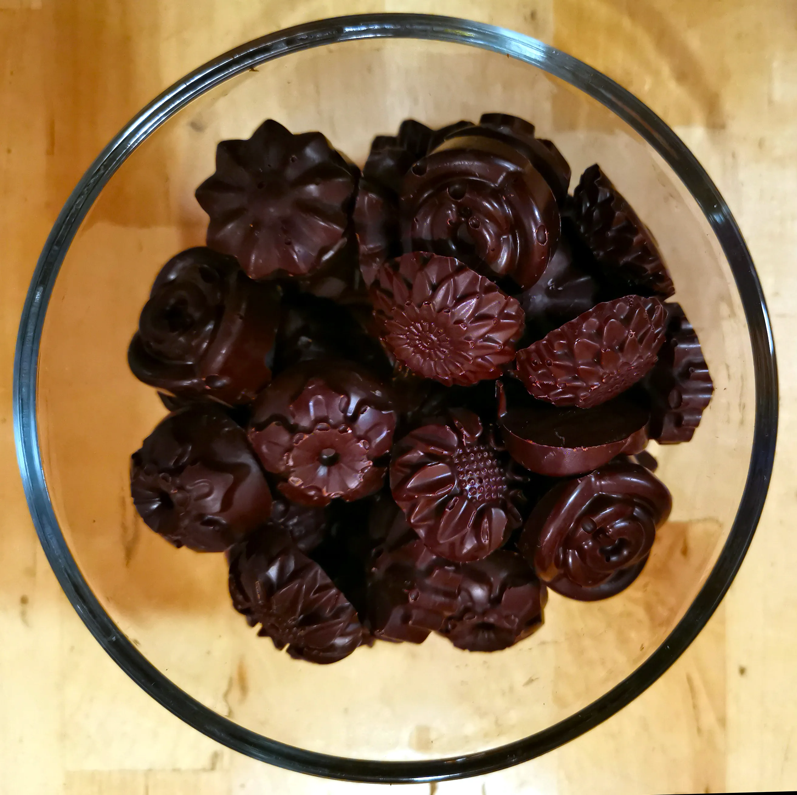 Cacao candies in a clear glass bowl